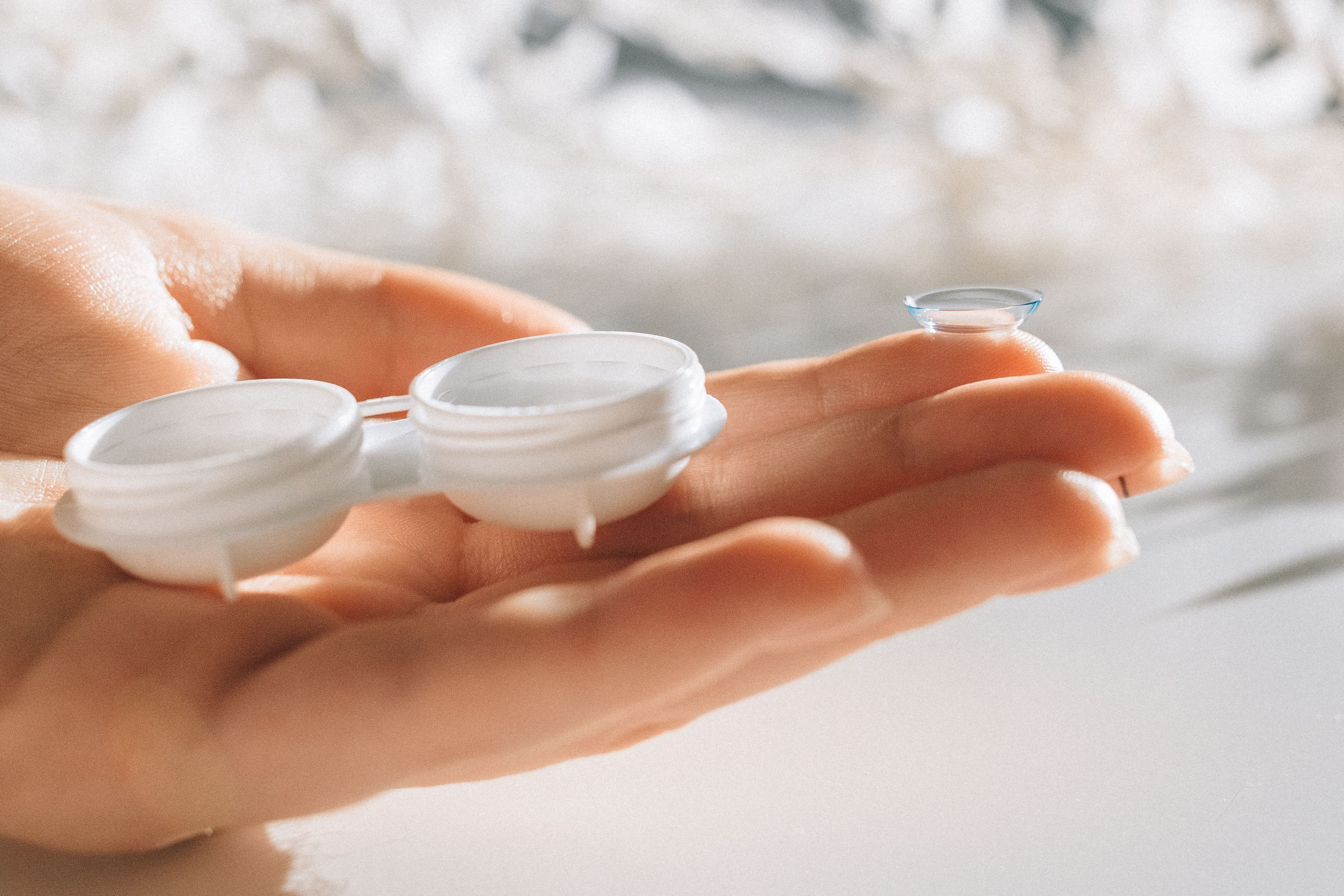 Person comfortably wearing contact lenses, natural lifestyle shot